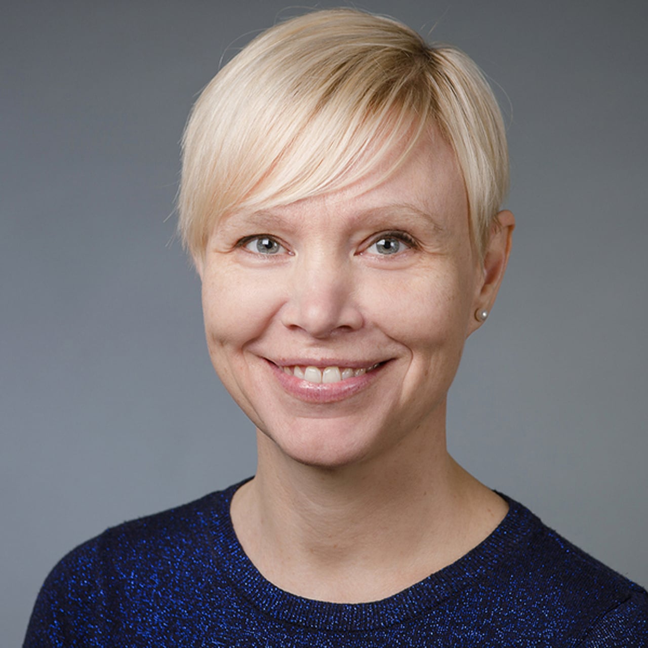 Porträtt av Urban Markström, professor vid Institutionen för socialt arbete och Susanne Tafvelin, docent vid Institutionen för psykologi.