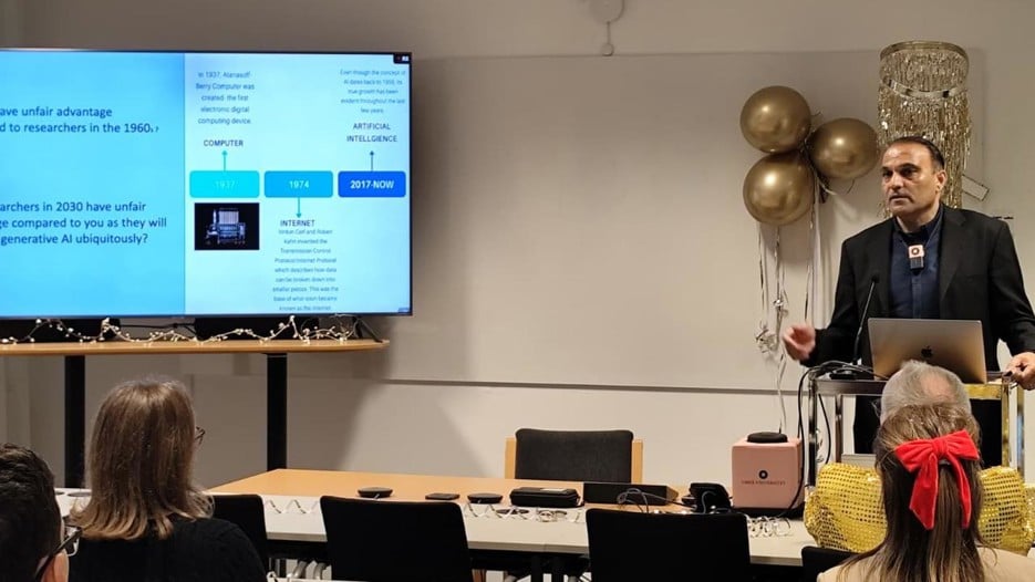 A man giving a presentation to a group of people.
