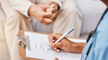Nurse, clipboard and medical checklist with patient for healthcare, life insurance or hospital service. Closeup doctor writing notes, consulting and report documents of surgery, test results and data