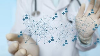 Doctor shows a medical network on a blurred background.