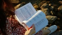 Person reading a thesis
