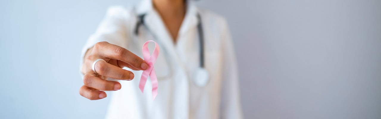 October Breast Cancer Awareness month, Woman holding Pink Ribbon for supporting people living and illness. Healthcare, International Women day and World cancer day concept