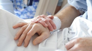 Nurses Hands Comforting Patient