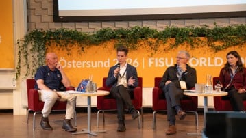 En panel om hälsoarbete vid universitet på en internationell konferens i Östersund.