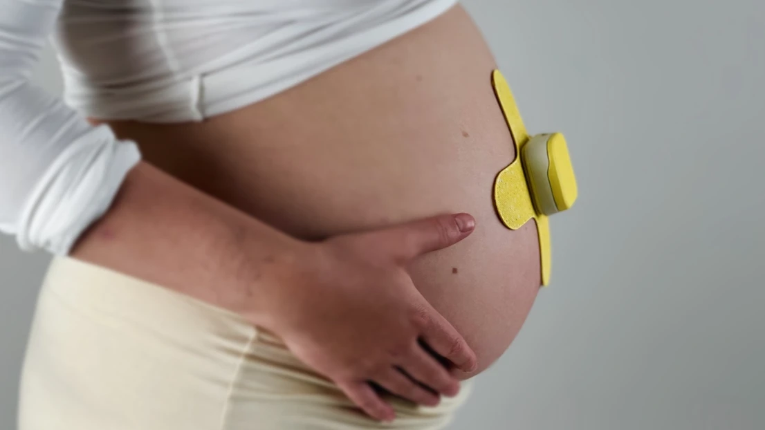 Placing the product on the pregnant belly.