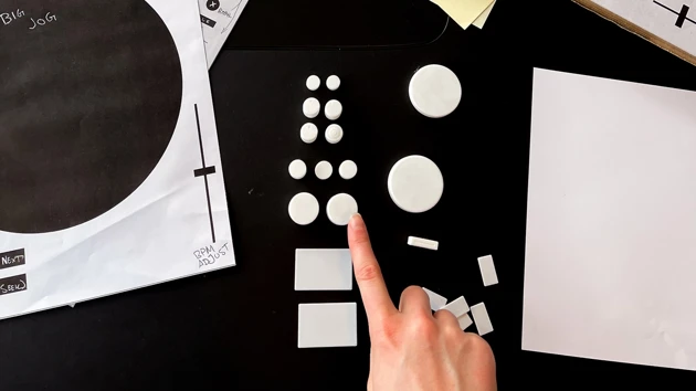 Exploration of button sizes and layouts during the prototyping phase. Each element was refined for tactility and clarity.