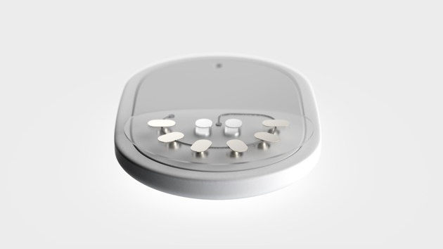 Two iontophoresis electrodes stimulate sweat glands, producing sweat that passes through six electrochemical sensors in a microfluidic channel.
