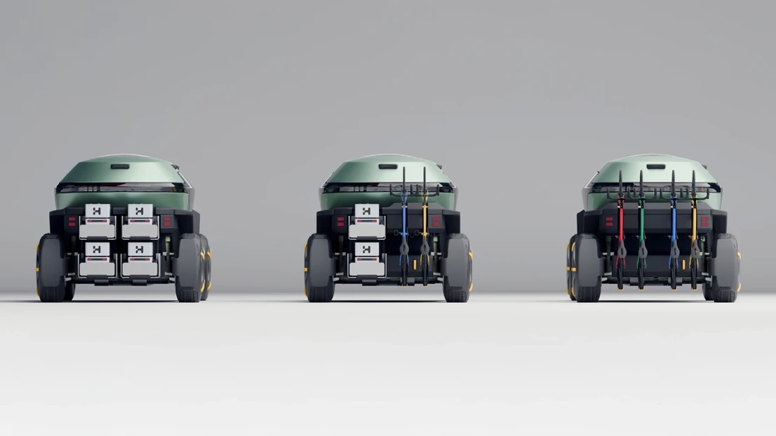 A functional exterior. Delivery robots can be deployed from the vehicle, a mothership solution. Bikes can be attached to continue the journey beyond the road.
