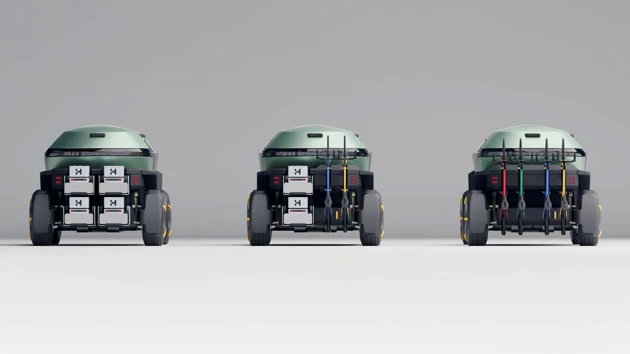 A functional exterior. Delivery robots can be deployed from the vehicle, a mothership solution. Bikes can be attached to continue the journey beyond the road.