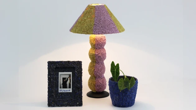 As a decorative surface: The pot is made from a single shredded football sock, and the lamp from two broken sweaters.