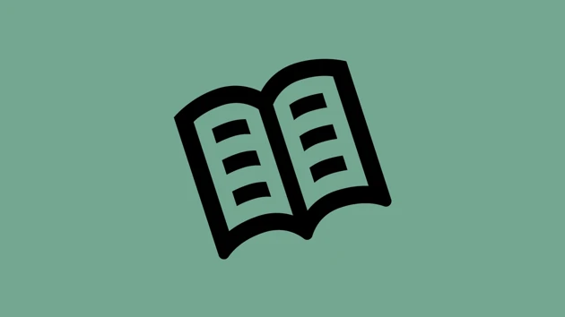 Uppslagen bok.