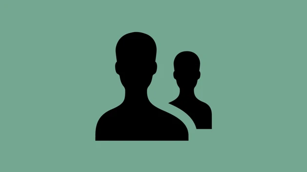 Silhuettes of two persons.