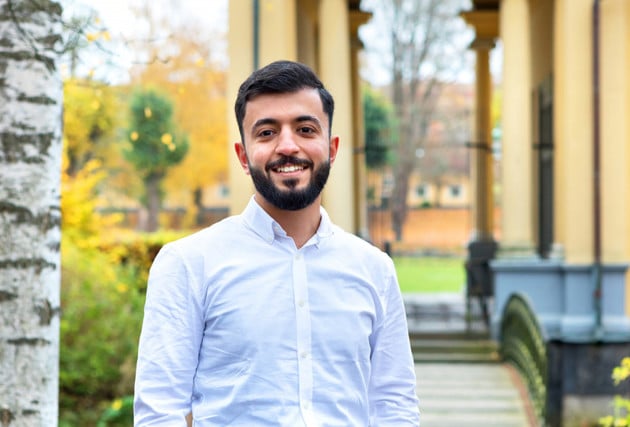 Photo of Mohammad Mshaleh standing outside Siemens Energy's office in Finspång