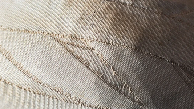 Detalj av textilt verk