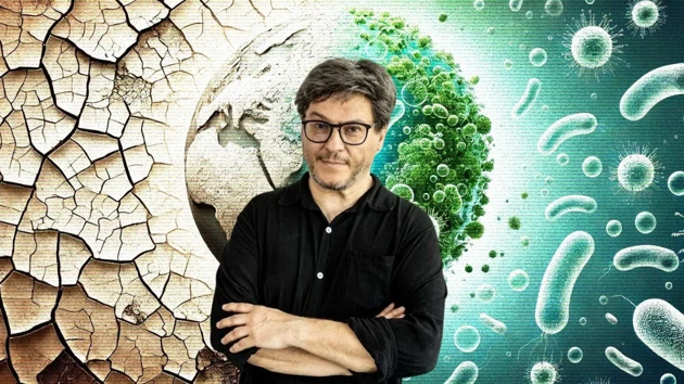 Ricard Solé, public speaker for the 15 year IceLab anniversary public lecture on terraforming ecosystems, seen here against an AI-generated backdrop depicting an arid ecosystem being transformed to a lush one thanks to synthetic organisms.
