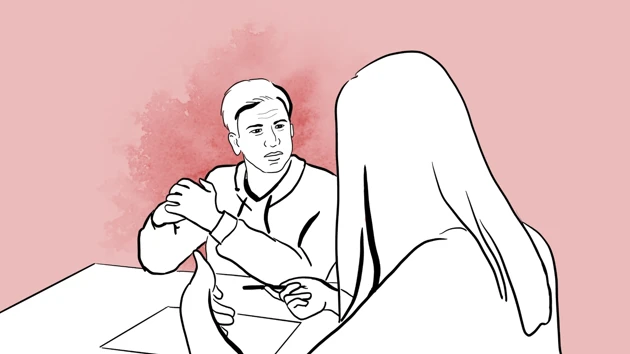 Två personer som pratar med varandra. 