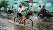 Översvämmad gata I Ho Chi Minh-staden.