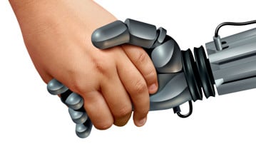 Barns hand håller i robothand. För att illustrera barn och artificiell intelligens.