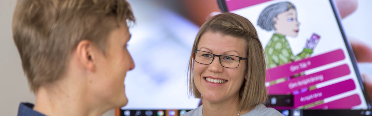 Porträtt på Britta Löfvenberg och Erik Vallgren vid ITS, IT-stöd och systemutveckling