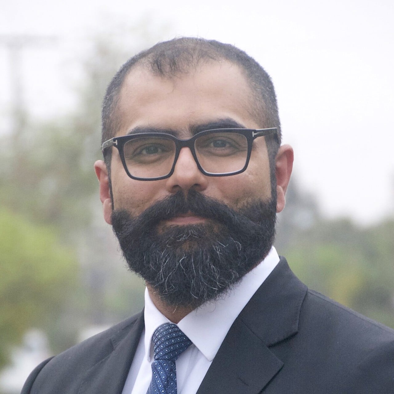 Portrait photo of alumnus Asim Mehmood