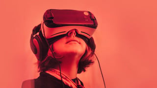Girl wearing VR goggle