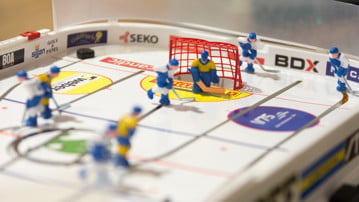 Bordshockeyspel.