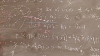 Bild på griffeltavla med matematiska formler