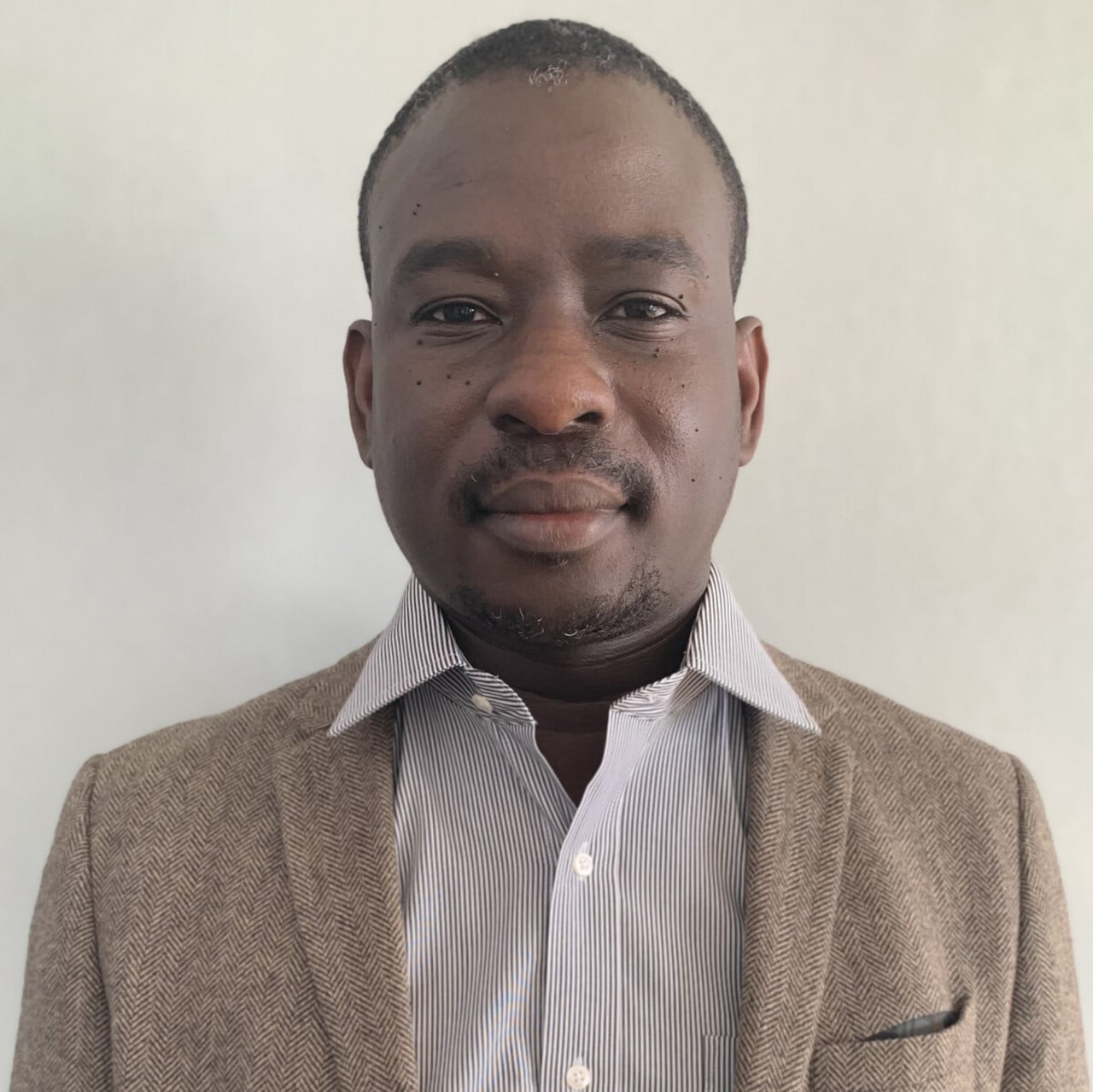 Porträtt av Maquines Odhiambo Sewe